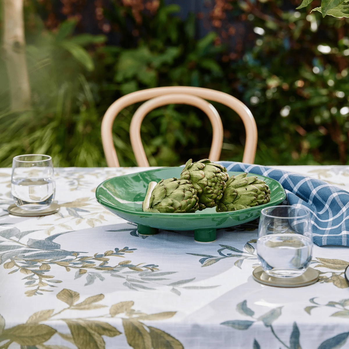 A set garden table with a green pedestal platter, Madras Link
